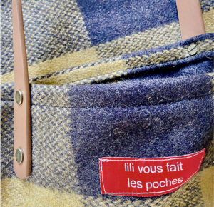 Gros plan sac tartan jaune et noir